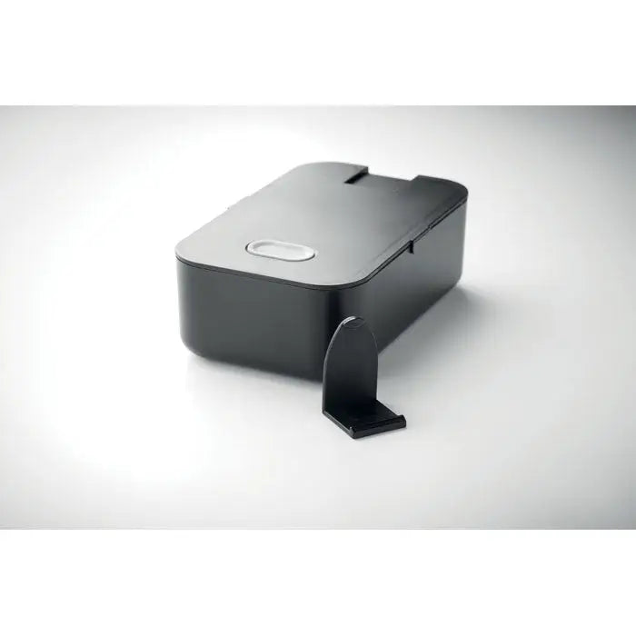 Cutie de pranz din pp neagra dreptunghiulara cu buton oval argintiu si suport negru asortat alaturi