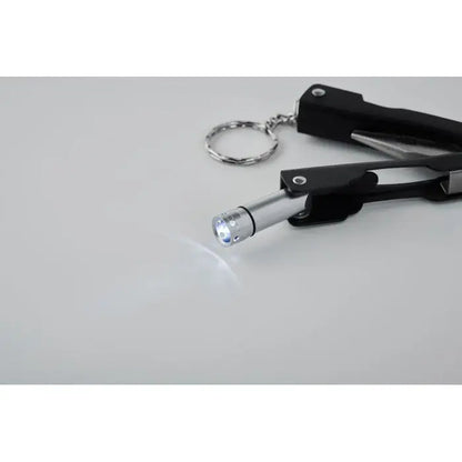 Lanternă compactă silver cu breloc negru, pliabilă cutit multifuncțional pentru portabilitate și utilitate