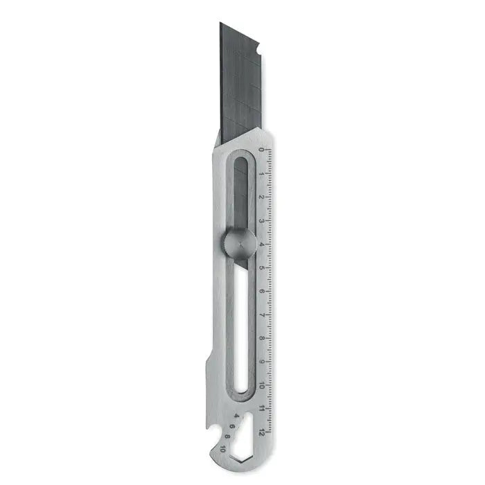 Cutit retractabil din metal argintiu cu lama retractabila si rigla integrata pentru taiere precisa