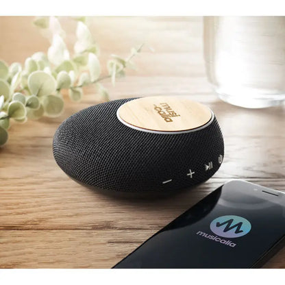 Difuzor multiplu wireless negru cu textură și panou superior circular din lemn cu logo musicalia