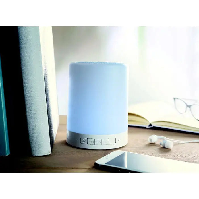 Difuzor wireless la atingere cilindric albastru cu baza argintie si butoane de control pentru sunet bluetooth