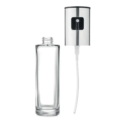 Dozator de pulverizare in sticla transparenta cu pompita metalica argintie eleganta pentru pulverizare usoara
