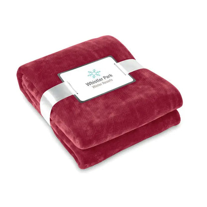 Flanel pătură roșie adâncă cu textură catifelată velour și etichetă albă whistler park winter resorts