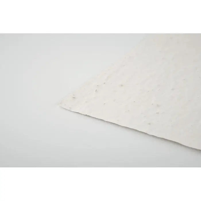 Foaie de hartie a6 cu seminte de flori salbatice texturata, de culoare off-white cu margini usor neregulate