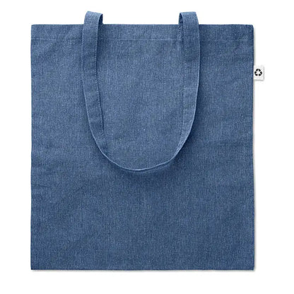Geanta de cumparaturi albastra din denim canvas cu manere asortate si eticheta alba mica pe partea laterala
