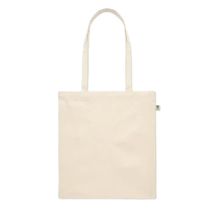 Geanta de cumparaturi din bumbac organic crem cu doua manere si eticheta mica pe lateral