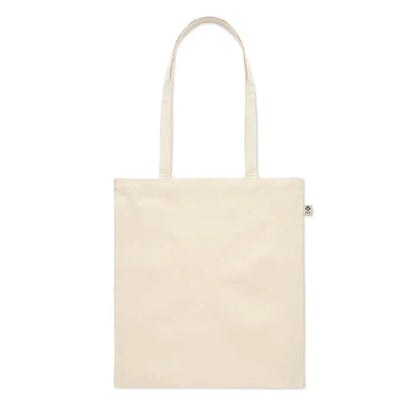 Geanta de cumparaturi din bumbac organic crem cu doua manere si eticheta mica pe lateral