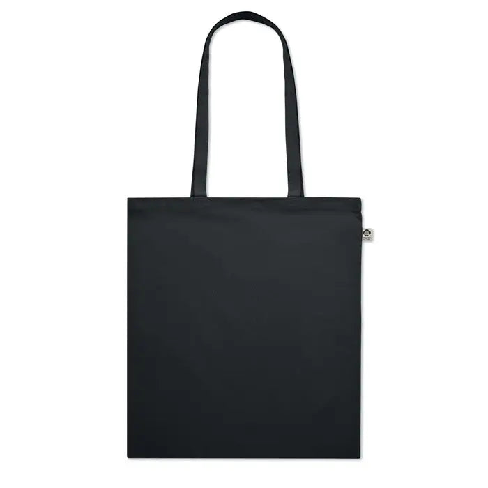 Geanta de cumparaturi din bumbac organic neagra cu doua manere rezistente si eticheta metalica mica pe lateral