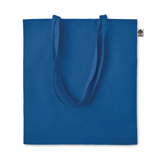 Geanta de cumparaturi din bumbac organic albastru royal cu manere din acelasi material si eticheta neagra mica