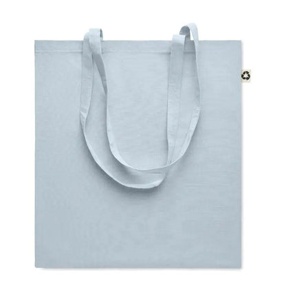 Geanta de cumparaturi din bumbac reciclat bleu cu manere asortate si eticheta mica reciclata