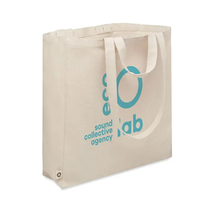Geanta de cumparaturi din bumbac reciclat bej cu logo si text albastru sound collective agency