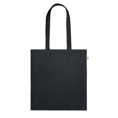 Geanta de cumparaturi din bumbac reciclat neagra cu manere rezistente si eticheta alba mica pe lateral