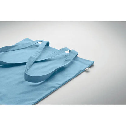 Geanta de cumparaturi din bumbac reciclat albastru deschis cu manere rezistente si design minimalist