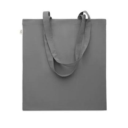Geanta de cumparaturi din bumbac reciclat gri minimalist cu manere rezistente si eticheta alba mica pe lateral