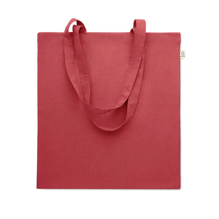 Geanta de cumparaturi din bumbac reciclat in culoare coral cu manere din acelasi material textil
