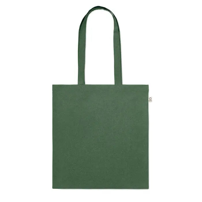 Geanta de cumparaturi din bumbac reciclat verde inchis cu doua manere si eticheta alba mica pe lateral