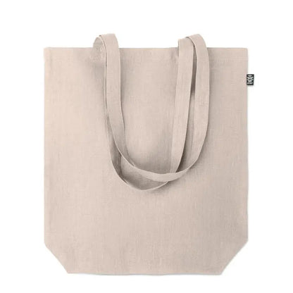 Geanta de cumparaturi din canepa 200 gr m² bej cu manere rezistente si eticheta neagra mica in colt