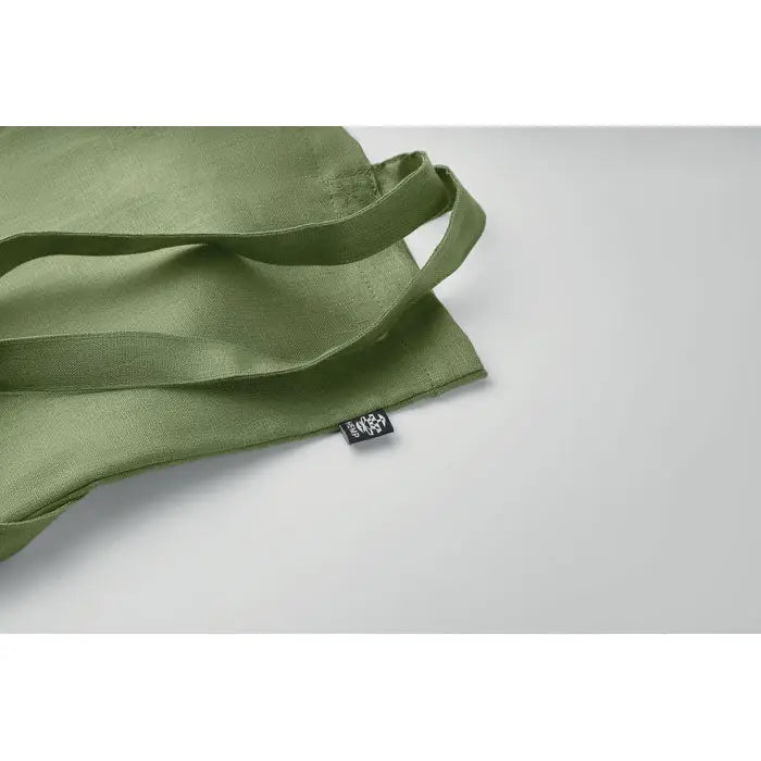 Geanta de cumparaturi din canepa 200 gr/m² olive cu manere rezistente si eticheta mica neagra