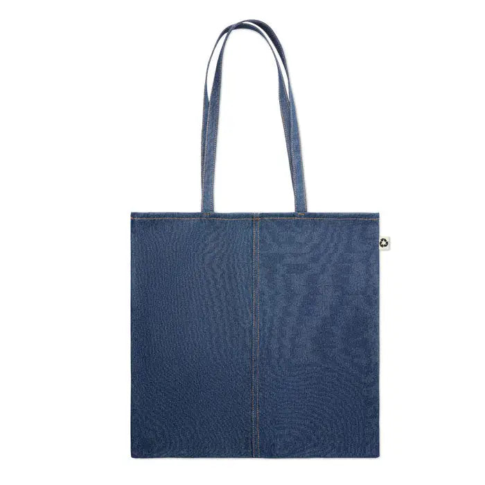 Geanta de cumparaturi din denim reciclat albastru cu manere asortate si eticheta alba mica pe lateral