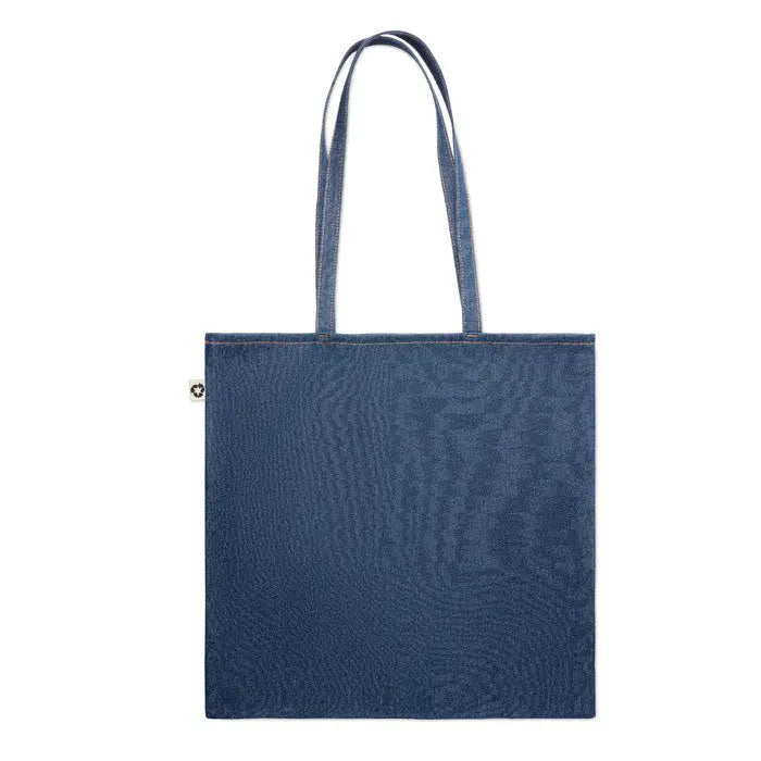 Geanta de cumparaturi din denim reciclat albastru cu manere asortate si eticheta alba mica pe lateral