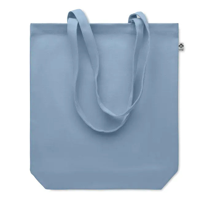 Geanta de cumparaturi din panza 270 gr m² albastru deschis cu manere din material textil si eticheta mica