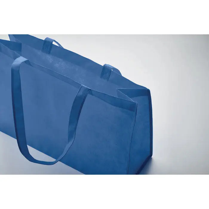 Geanta de cumparaturi albastra din rpet netesut cu manere rezistente si design minimalist