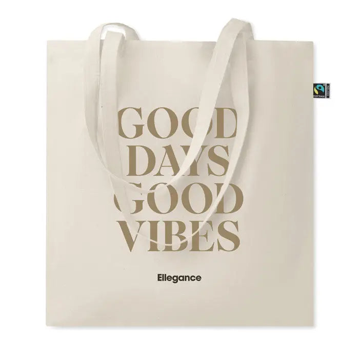 Cream-colored canvas tote bag fairtrade with good days good vibes print and ellegance brand name below