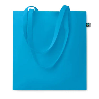 Geanta de cumparaturi fairtrade 140gr m² din panza albastru deschis cu manere asortate si eticheta neagra mica