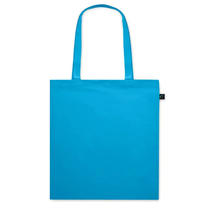 Geanta de cumparaturi fairtrade albastra din panza 140gr/m² cu manere asortate si eticheta neagra mica