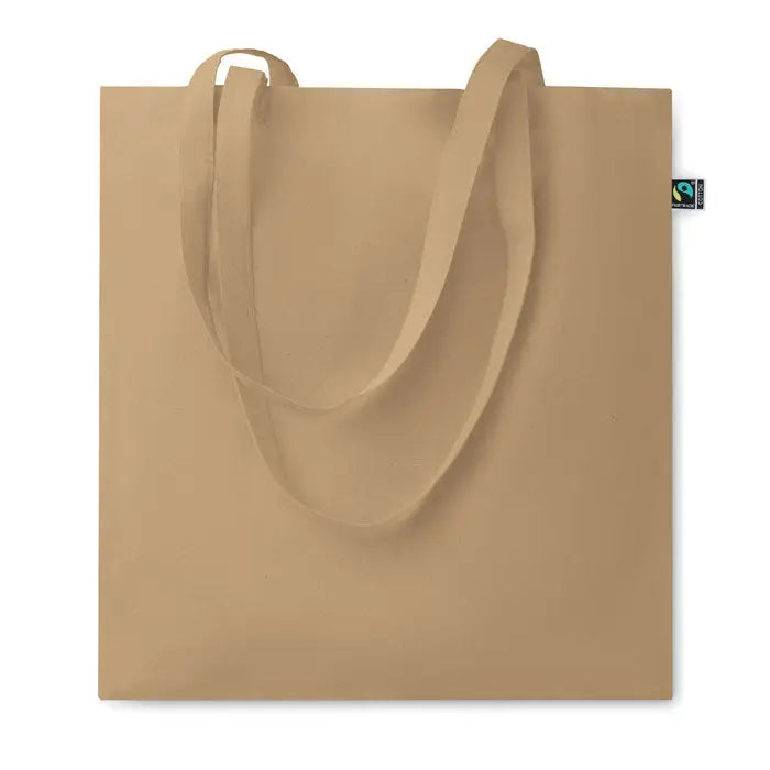 Geanta de cumparaturi fairtrade140gr/m² din panza bej cu manere asortate si eticheta mica fair trade in colt