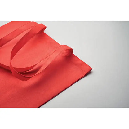 Geanta de cumparaturi rpet netesuta rosie cu design minimalist si manere rezistente pentru uz zilnic