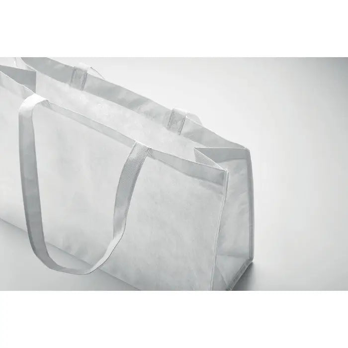 Geanta de cumparaturi rpet netesuta din plastic transparent cu manere albe intarite si design minimalist