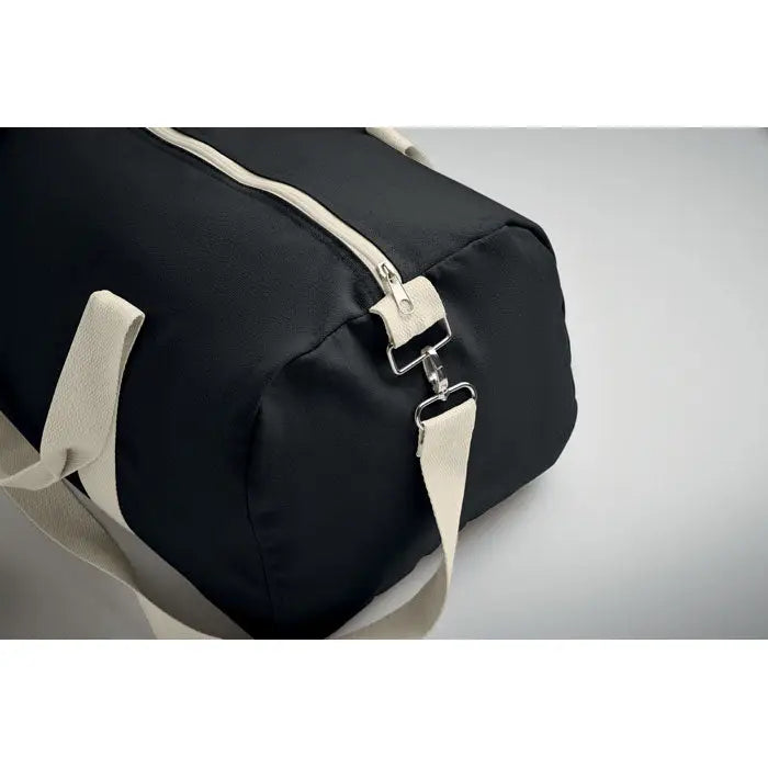 Geanta de mana reciclata 320 gr/m² din panza neagra cu bretele si fermoare crem din material textil
