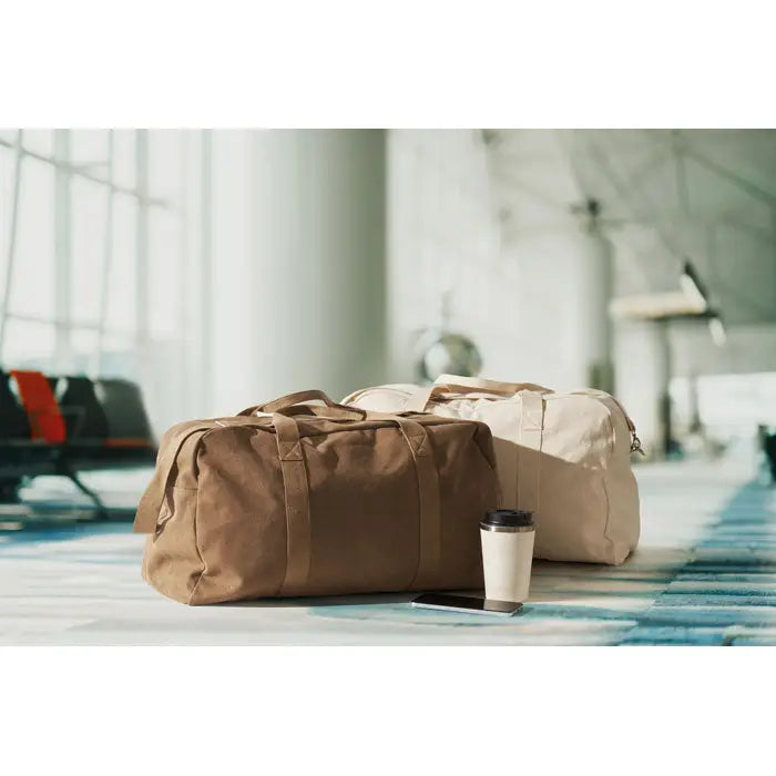 Geanta de voiaj duffle 450 gr m² din pânză crem cu mâner rezistent și design minimalist