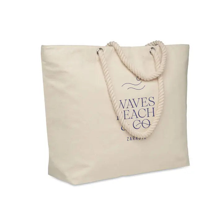 Geanta frigorifica de plaja din bumbac crem cu manere groase tip franghie si logo waves & beach co. bleumarin