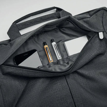 Geanta laptop in 2 tonuri 360d din material texturat gri inchis cu buzunar interior cu fermoar pentru telefon si accesorii