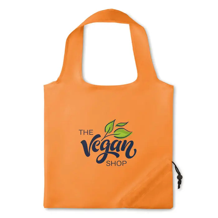 Geanta pliabila din poliester 210d portocalie cu logo the vegan shop si frunze verzi, ideală pentru cumpărături