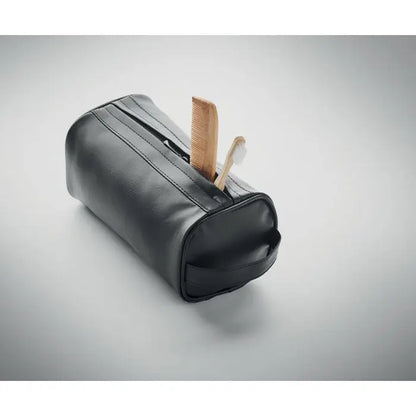 Geanta si fermoar pentru cosmetice moale din piele neagra cu maner mic si continut perie si pieptene din lemn