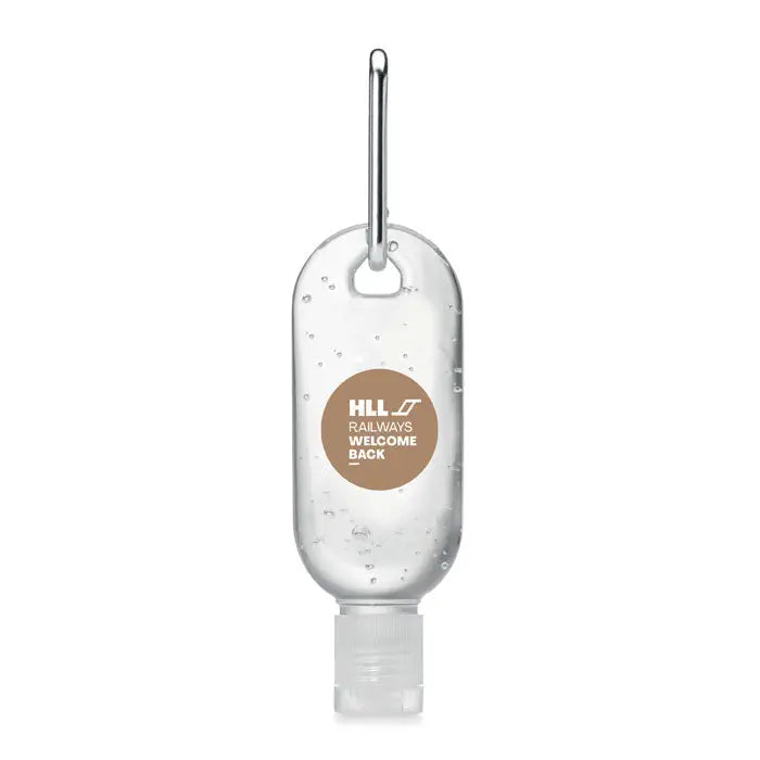 Gel de curatare maini 30 ml din plastic transparent cu clips metalic argintiu si eticheta maro hll railways welcome back
