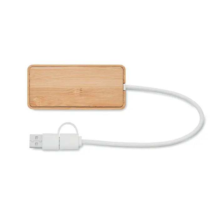 Hub bamboo usb cu 3 porturi este un suport de incarcare dreptunghiular din bambus natural cu cablu usb alb atasat