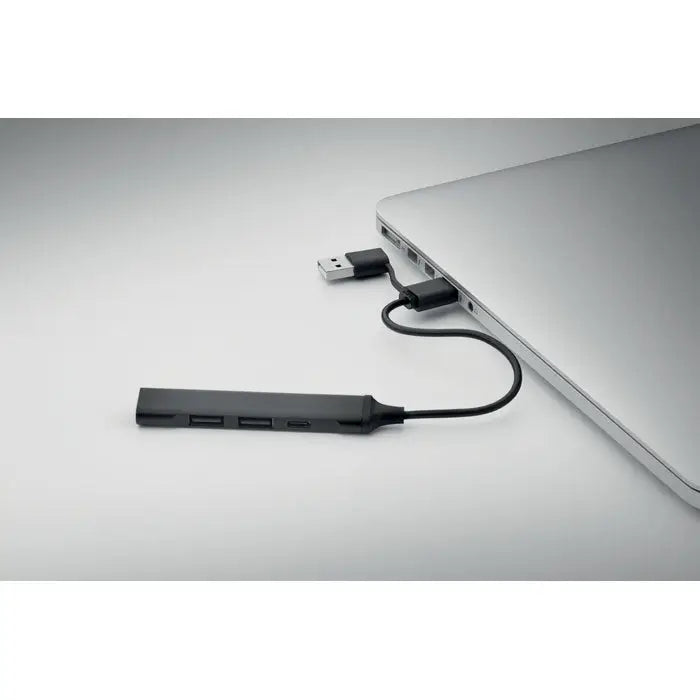 Hub usb 4 porturi 19 cm negru cu cablu scurt conectat la laptop pentru extinderea porturilor usb