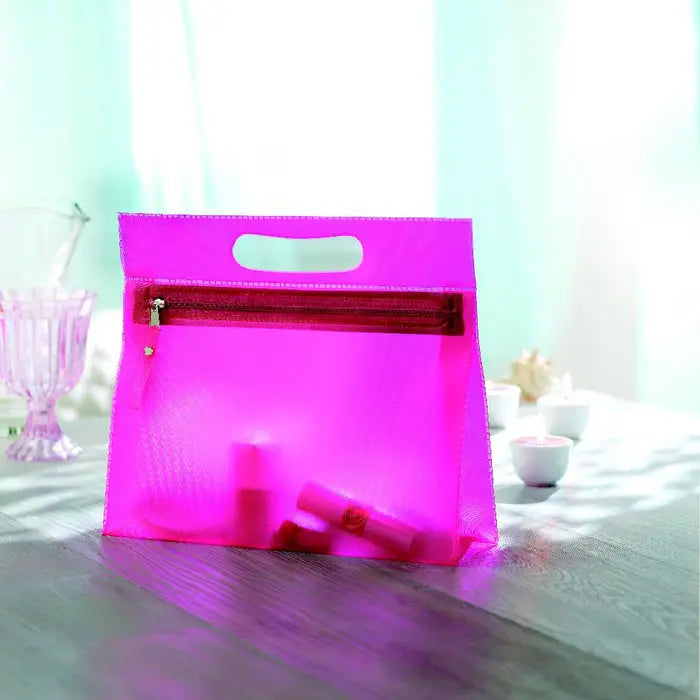 Husa cosmetica transparenta din plastic fucsia translucida cu maner si inchidere cu fermoar pentru cosmetice