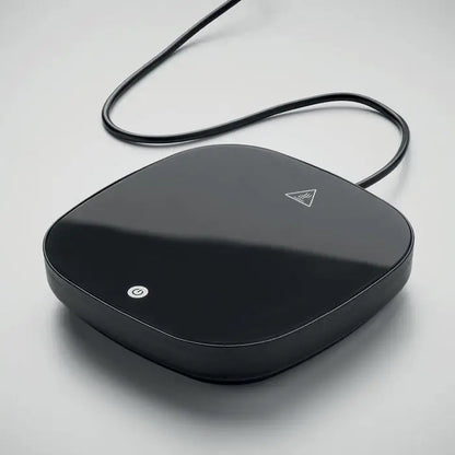 Incalzitor de cani din abs cu design negru lucios rotunjit si buton de pornire alb subtil