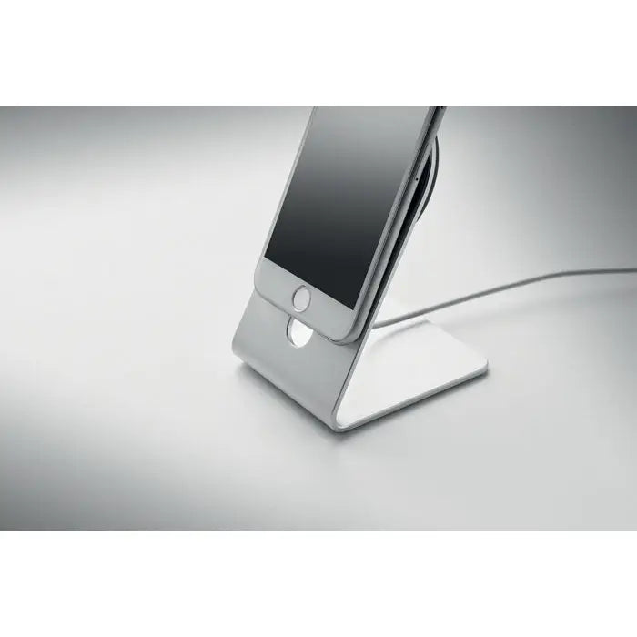 Stand telefon argintiu din aluminiu cu design minimalist care sustine un incarator magnetic portabil 15W