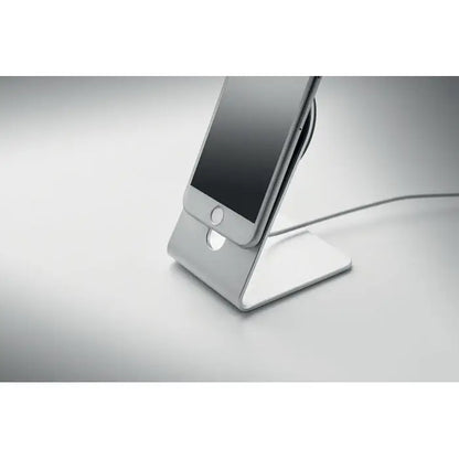 Stand telefon argintiu din aluminiu cu design minimalist care sustine un incarator magnetic portabil 15W