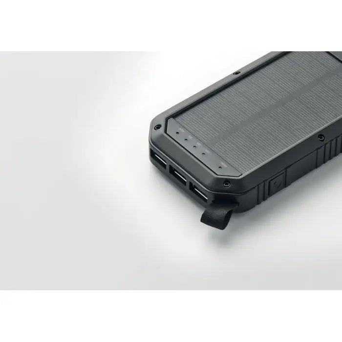Încărcător solar portabil negru 8000 mAh cu suprafață texturată și multiple porturi usb robust