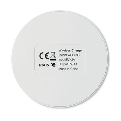 Incarcator wireless 5w alb circular cu finisaj mat si specificatii tiparite pe partea din spate a produsului