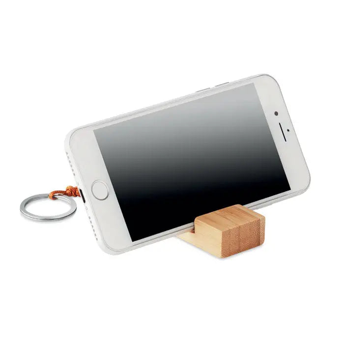Stand pentru smartphone din lemn deschis la culoare cu inel de chei atasabil pentru suport si transport facil