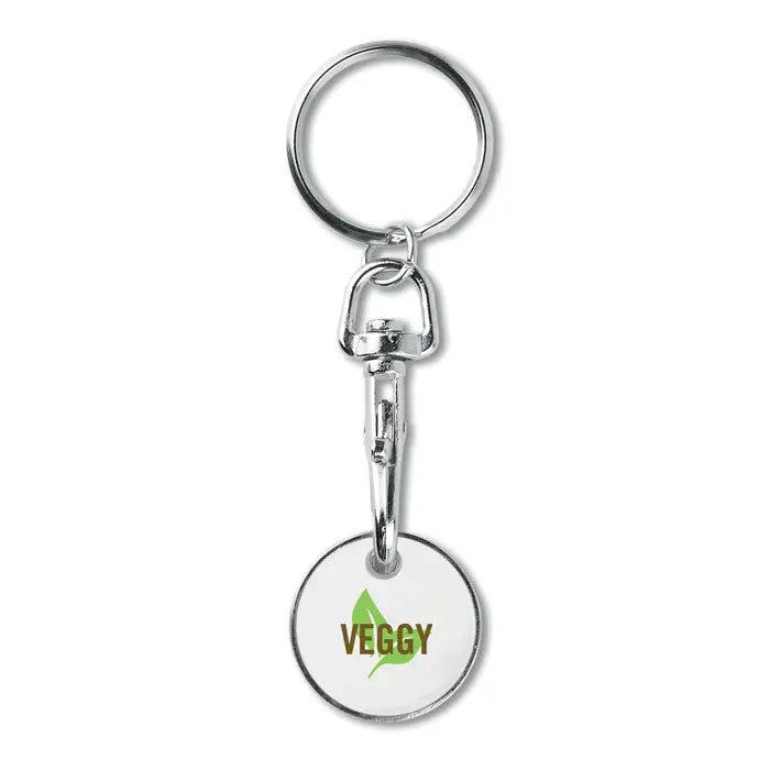 Jeton pentru chei din metal argintiu cu etichetă albă rotundă inscripționată veggy maro și frunză verde