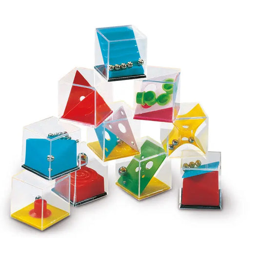 Jocuri puzzle asortate cuburi transparente colorate cu trasee mecanice interioare si interior vibrant rosu albastru verde galben